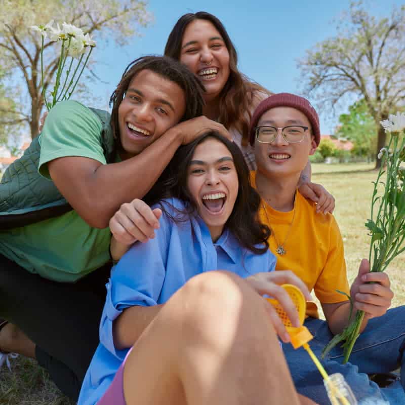 EMDR Therapy session with happy clients outdoors.