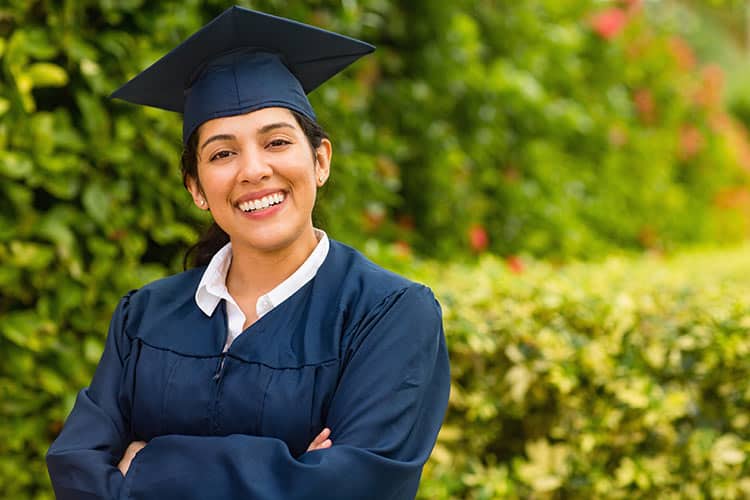 Graduation cap and gown symbolizing achievement and new beginnings.