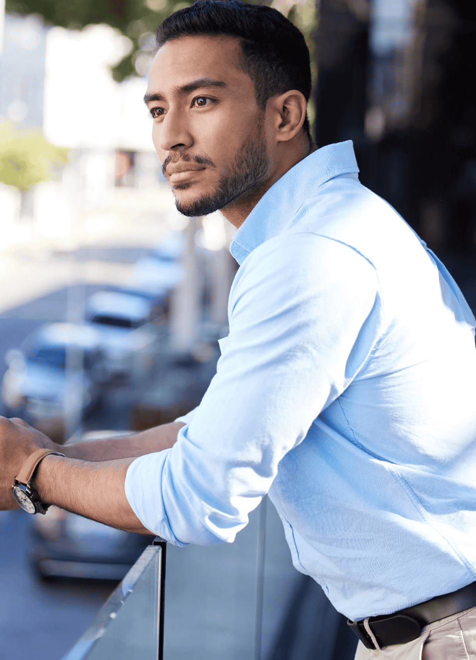 Thoughtful man reflecting outdoors, symbolizing life transition therapy and mental clarity.